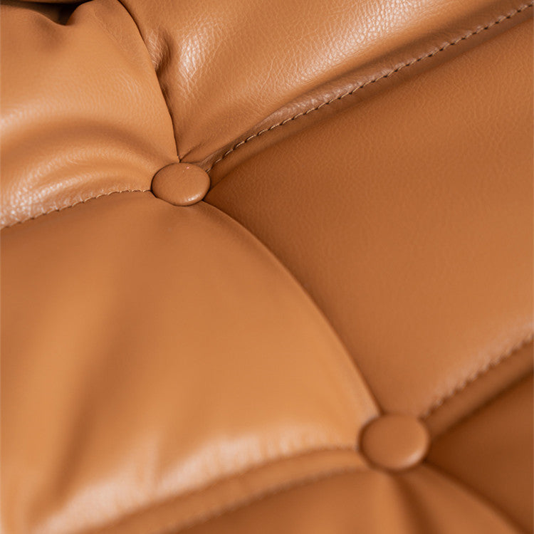 Kruska Faux Leather Lounge chair