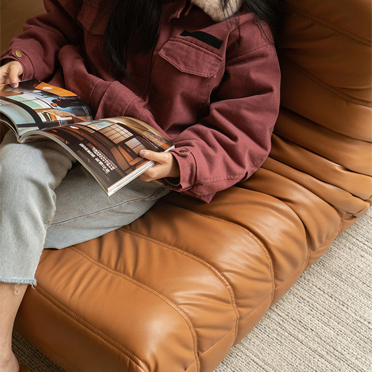 Kruska Faux Leather Lounge chair